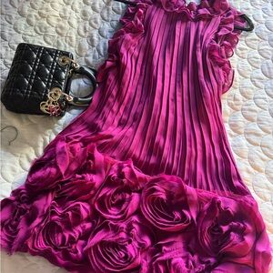 Vibrant Pink Pleated Dress with Ruffle Details